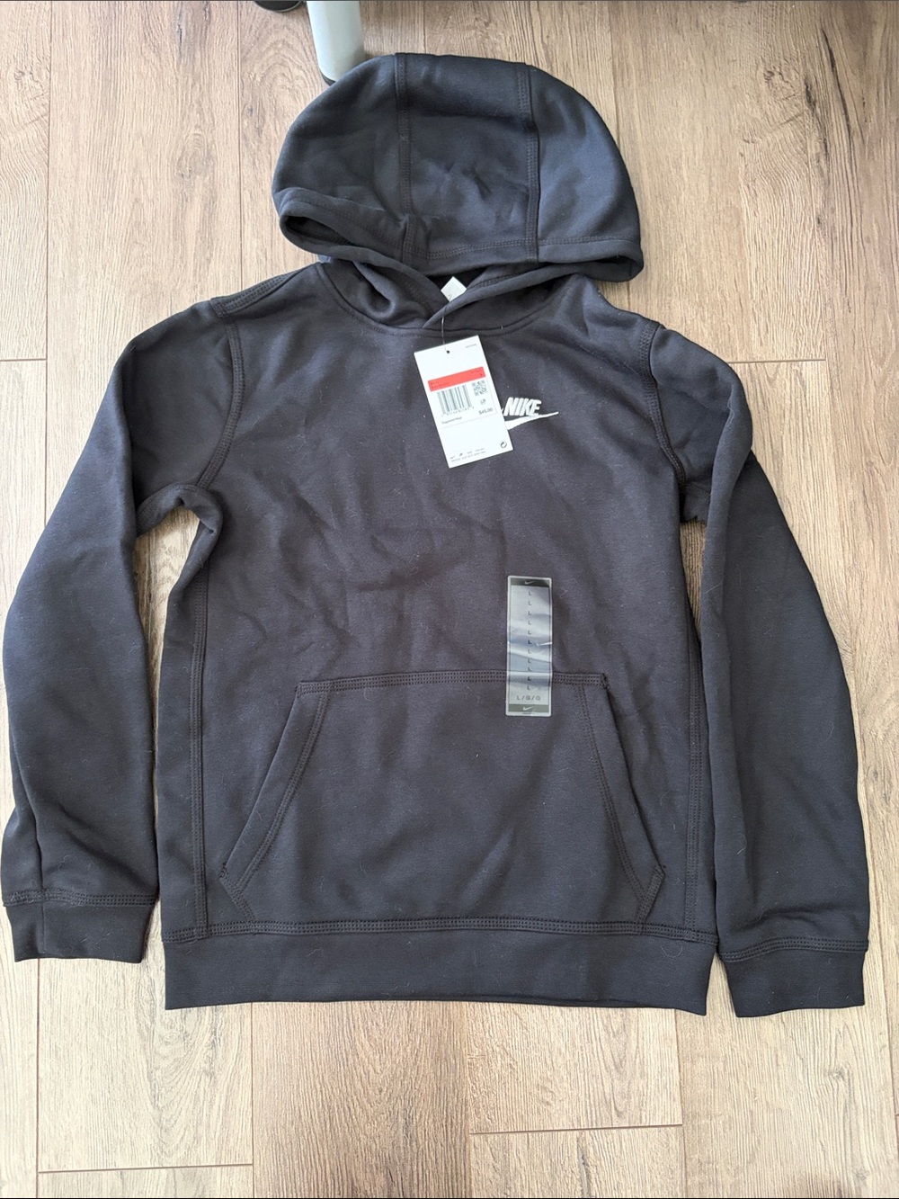NWT Nike Black Pullover Hooded Sweatshirt with White Swoosh. Kids size Large